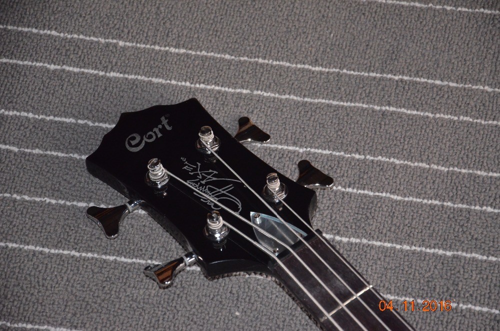 4 string bass guitar Cort GENE SIMMONS AXE Guitar High quality in stock and free shipping with low cost Factory supply d