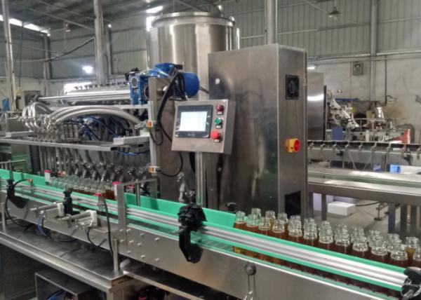 Professional Honey Volumetric Liquid Filling Machine Water Bottle Packing