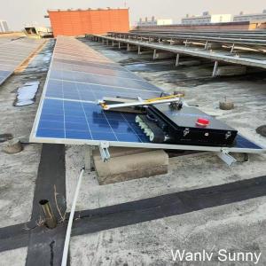 PLC Controlled Crawler Type Cleaning Robot for Large-Scale Solar Panel Array