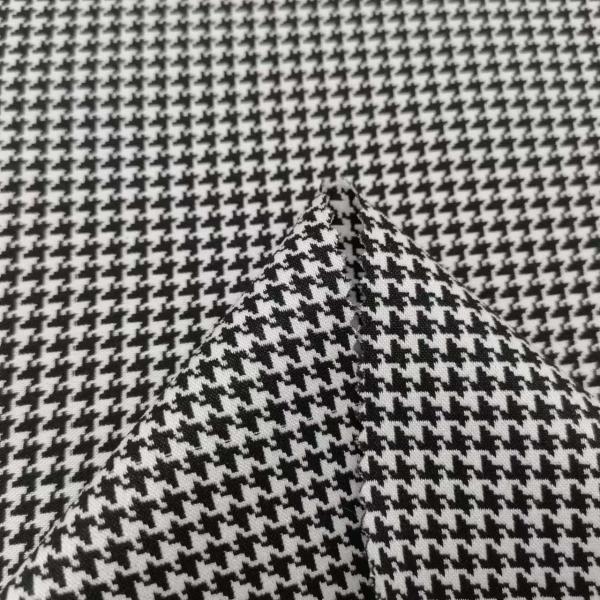 Printed 2 Way Stretch 19% Nylon 25% Polyester 52% Rayon 4% Spandex Faille Fabric