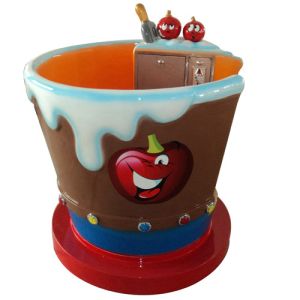 Coin operated kiddie ride ice cream cup swing and rotating back and forth with