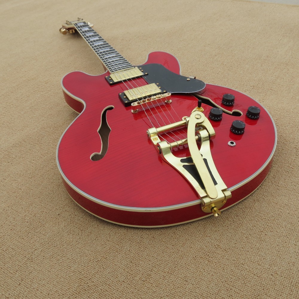 2017 hollow body electric guitar quilt flame on body top and back ,Natural wood color,gold hardware