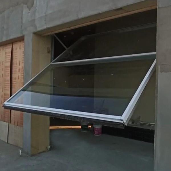 Quality Tilt Up Overhead Toughened Glass Door for sale