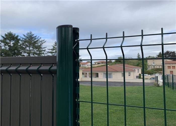 green colored peach post curved mesh fence 