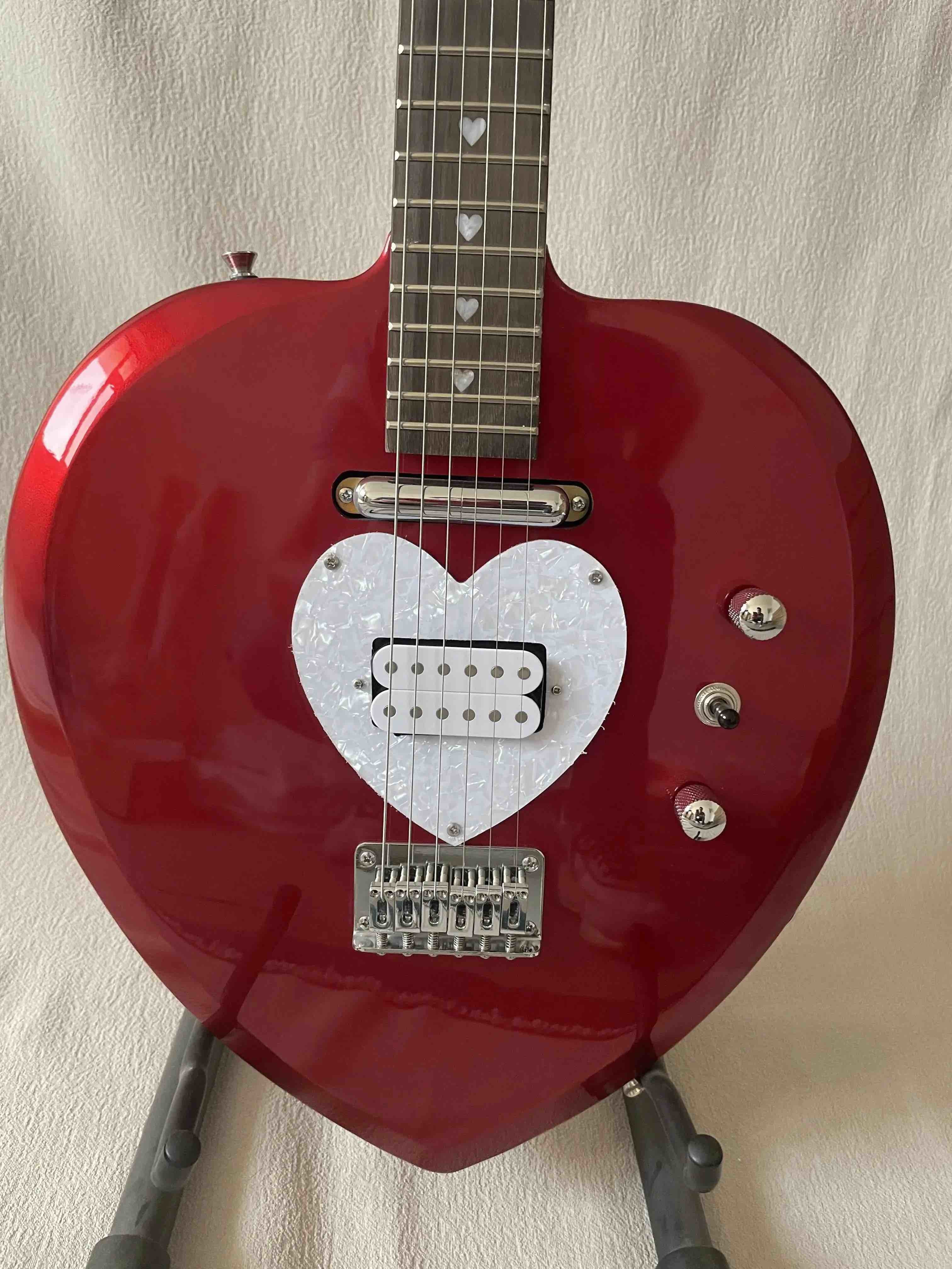Custom Heart Shaped Electric Guitar in Black Short Scale Mahogany Body Humbucker Pickups Professional Guitar