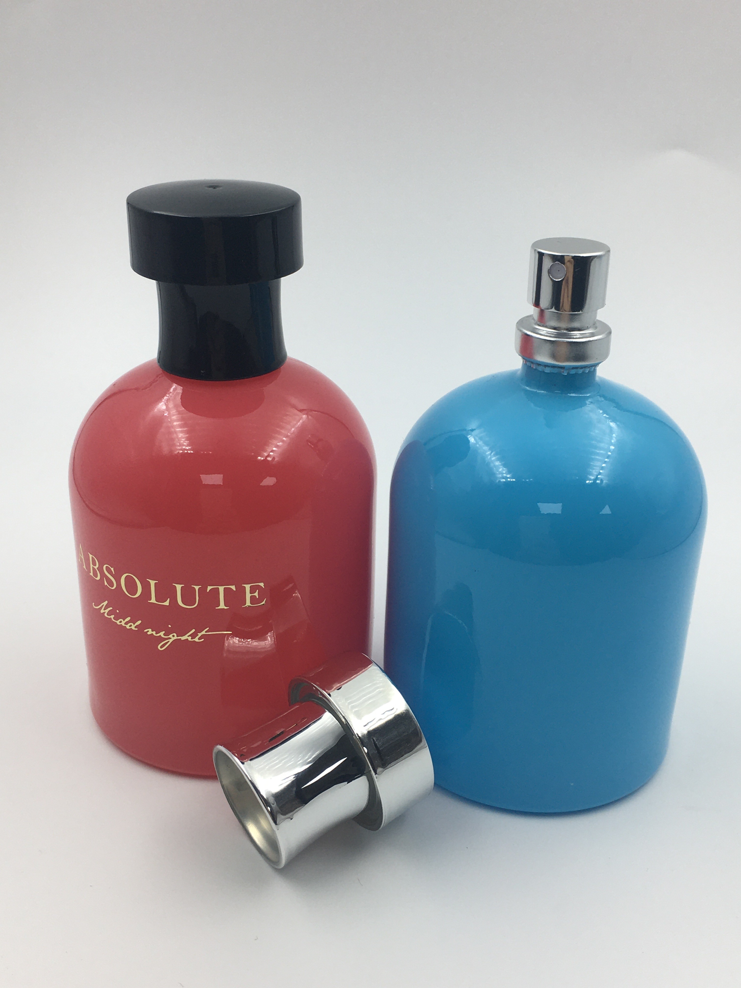 Round Shoulder Luxury Glass Perfume Bottle 100ml Blue Red Customized