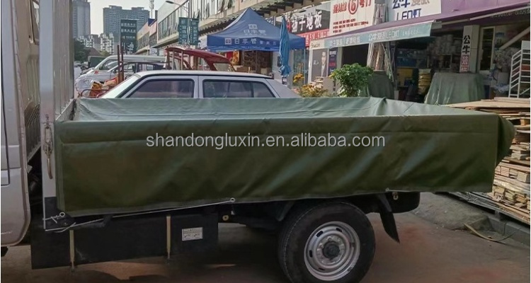 Sturdy Green PVC Tarpaulin Ideal for Blocking Sunlight and Moisture in Outdoor Settings