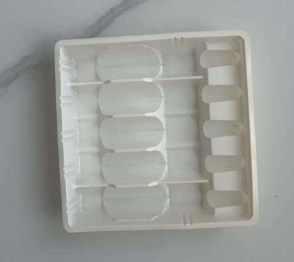White PET drug plastic blister inside anti-counterfeiting design pattern ampoule