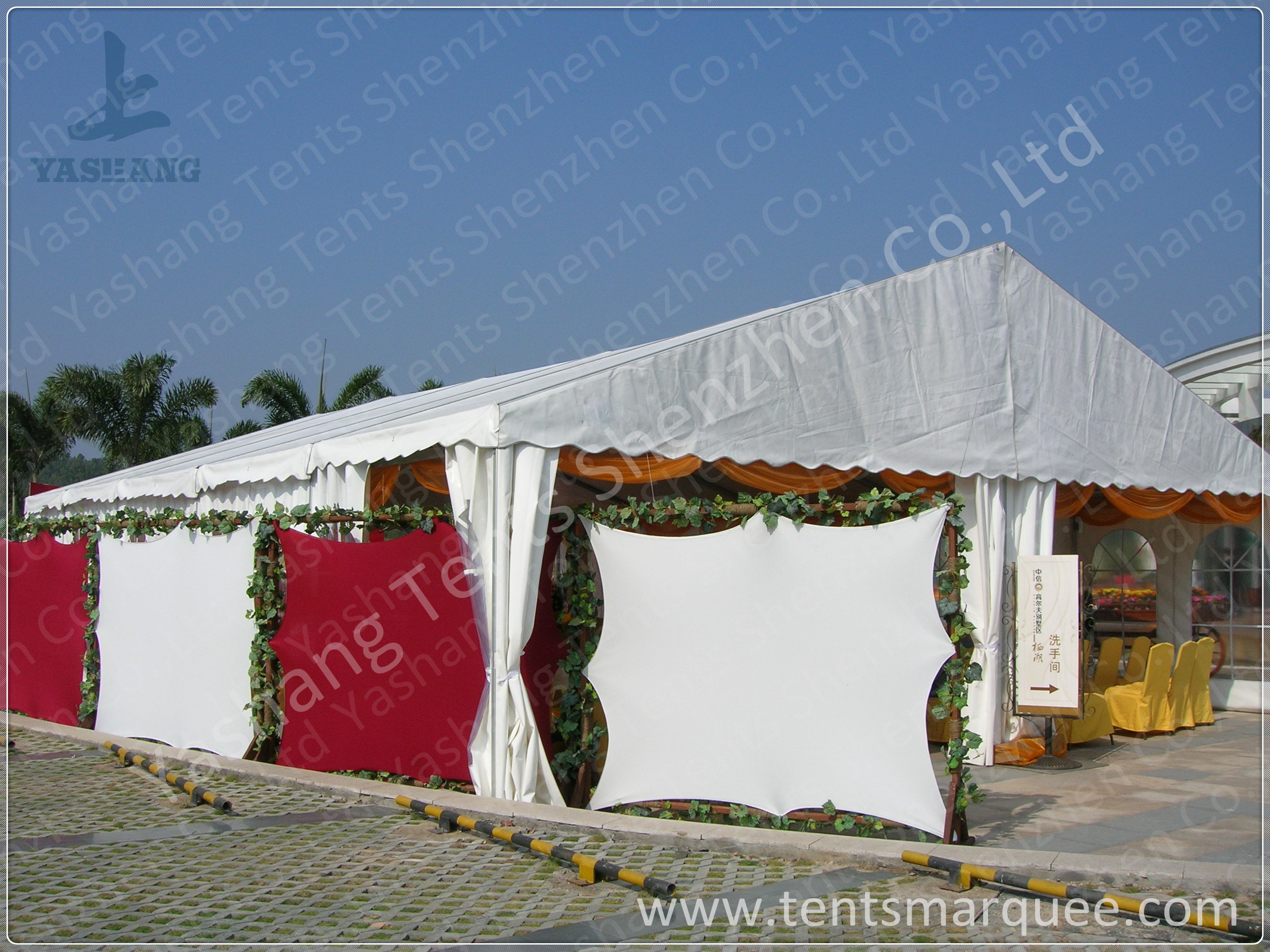 White Roof Cover outside event tents for Golf Villas Sales Conference with orange ripples