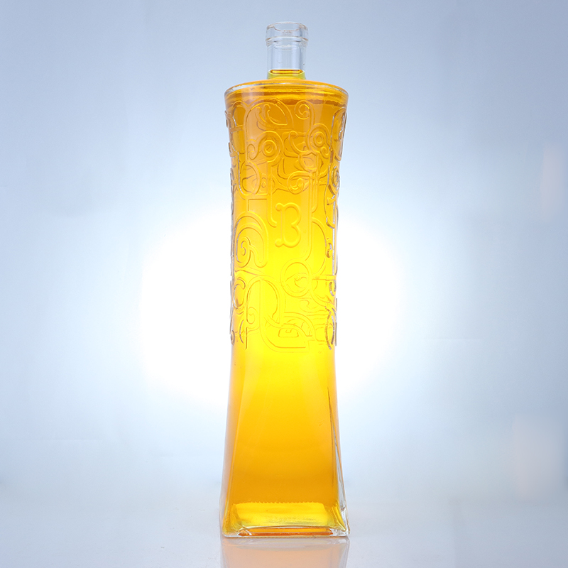 Industrial Liquor Glass Bottle with Unique Shape and Embossed Super Flint Material