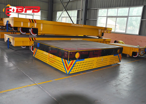 Electric Battery Operated Trackless Trolley Cart On Floor For Workshop Parts Handling