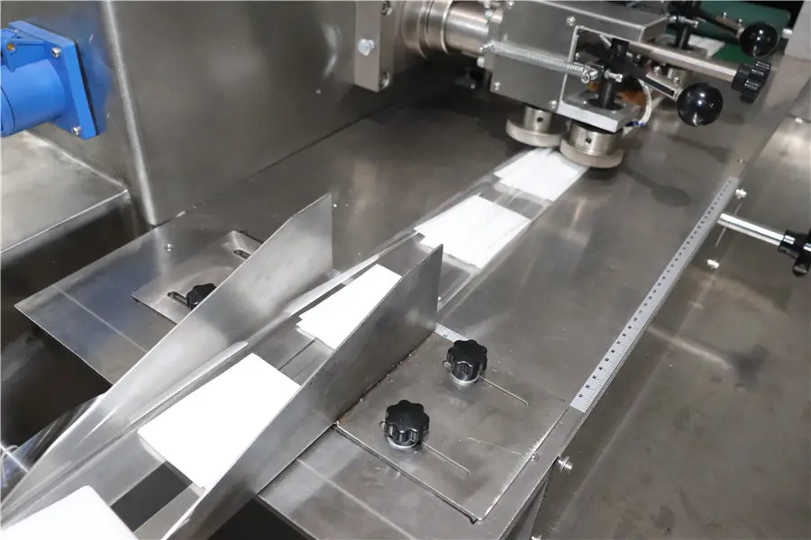 380V 50Hz Wet Towel Folding Slitting Packing Machine Automatic Towel Roll Packaging Line