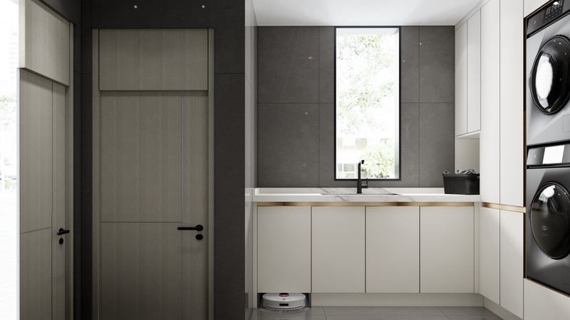 Modern Clean U-Shaped Custom Made Laundry Cabinets With White Paneling And Gold Accents