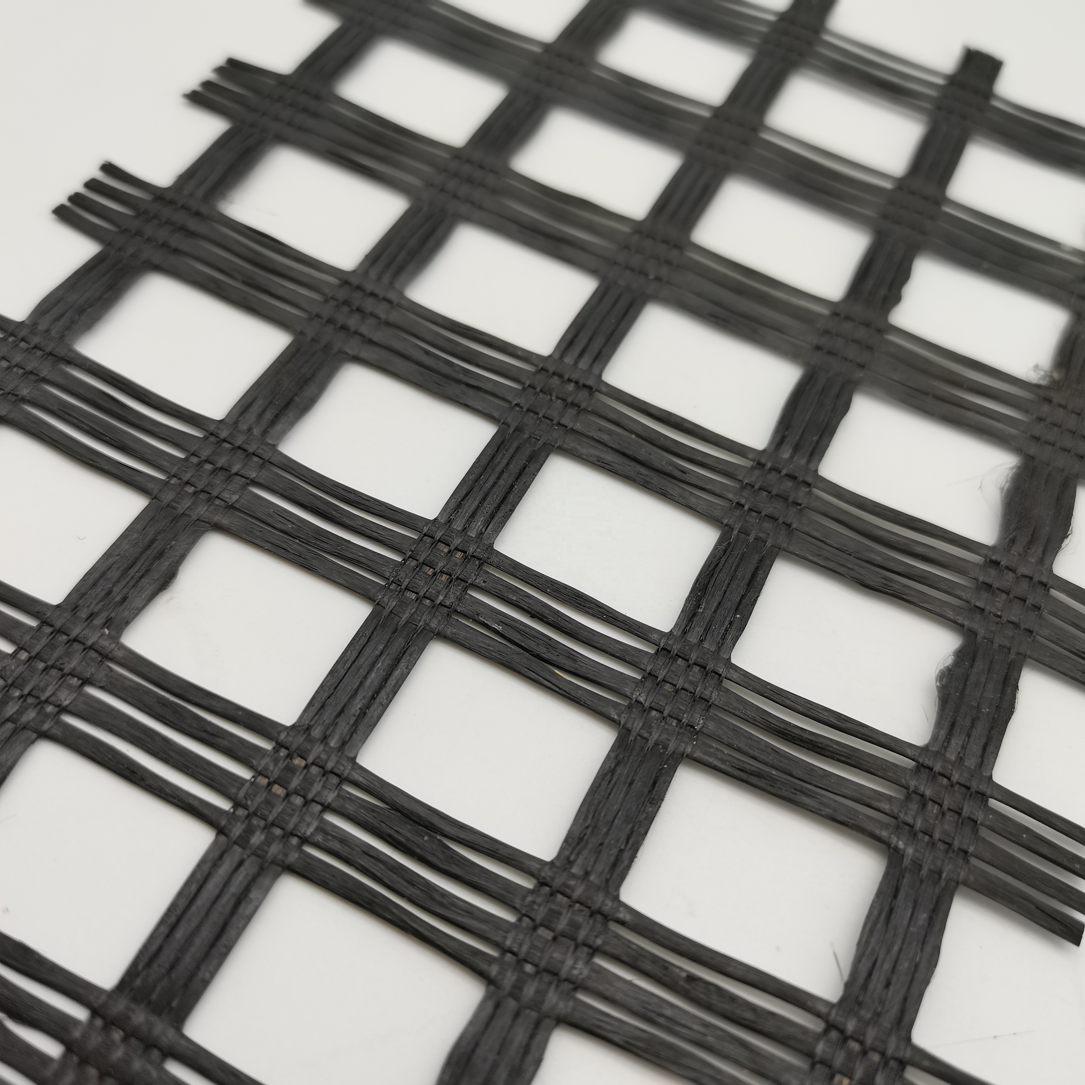 80kn Fiberglass Mesh Geogrid For Roadbed Solidification In Biaxial Polyester