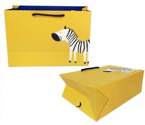 China FSC ISO9001 Yellow Clothing Paper Bags Zebra Print Duplex Board Paper Bag on sale