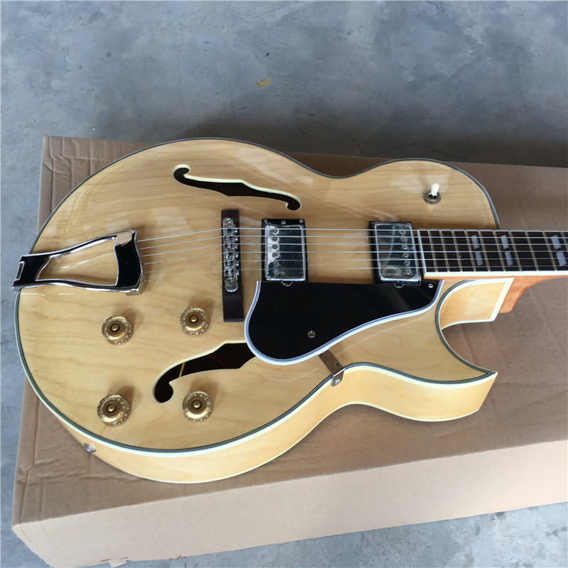 Hollow body jazz guitar with maple body neck