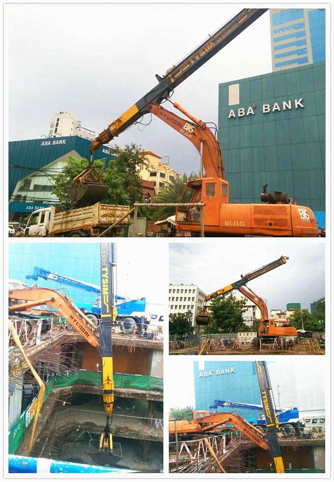 Excavator rotating clamshell grapple bucket for telescopic arm