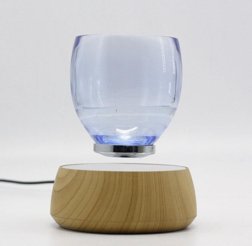 hotsale magnetic levitation transparent glass cup drink display stand