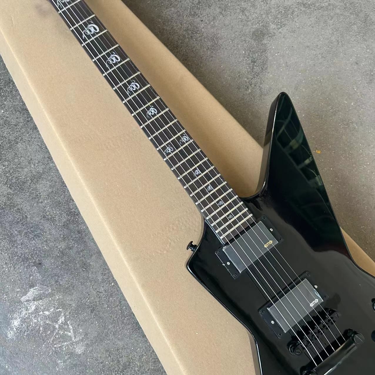 Custom special shape body ESP style electric guitar in black color glossing finish