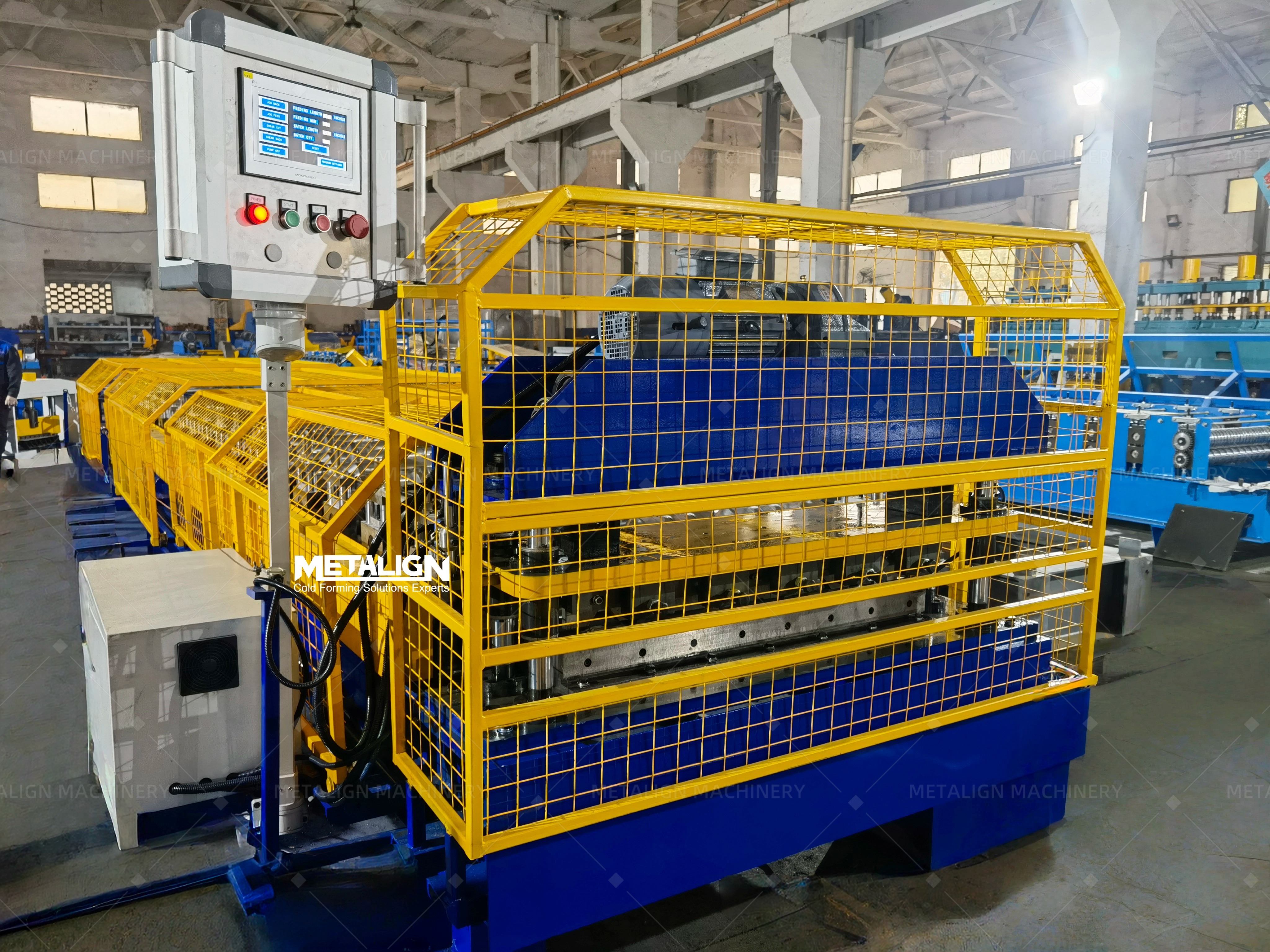 Chain Driven Roll Former With Protective Cover Producing Double Layer Roof Panels